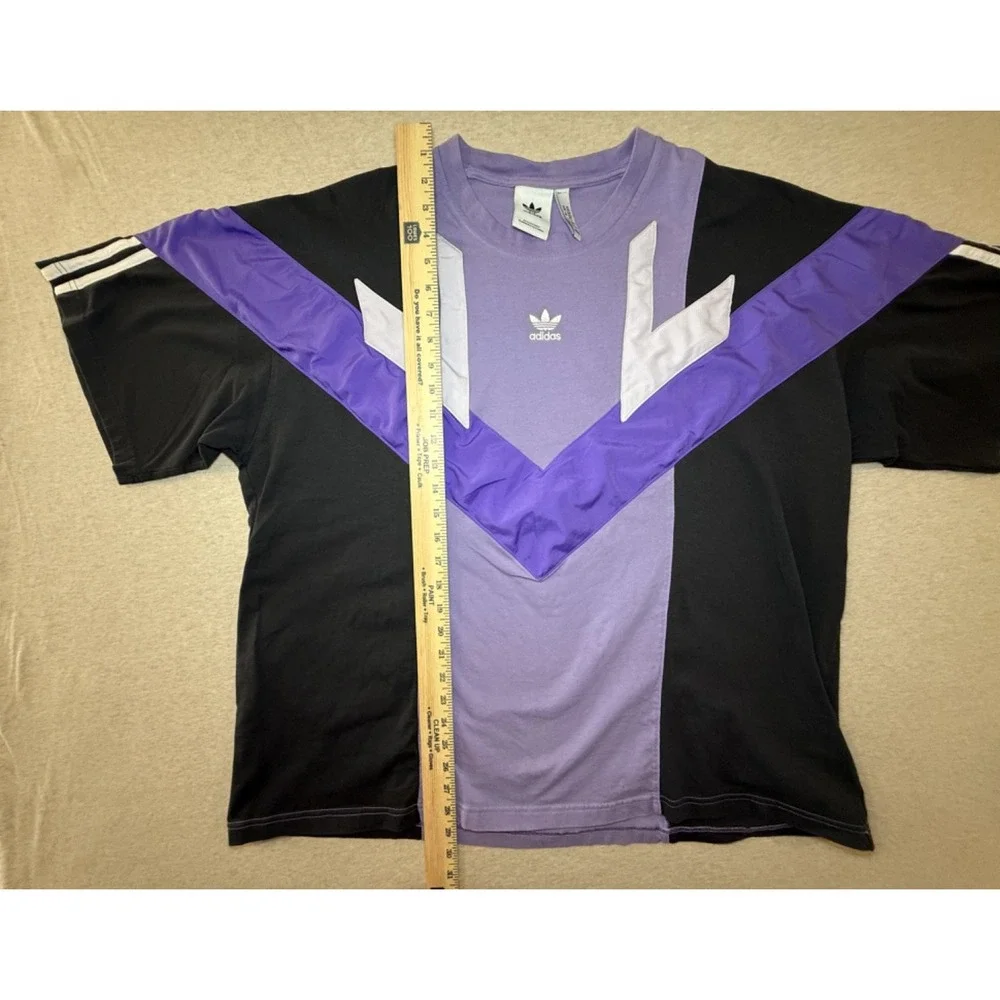 Adidas. size 2XL. Purple and Black retro style tshirt